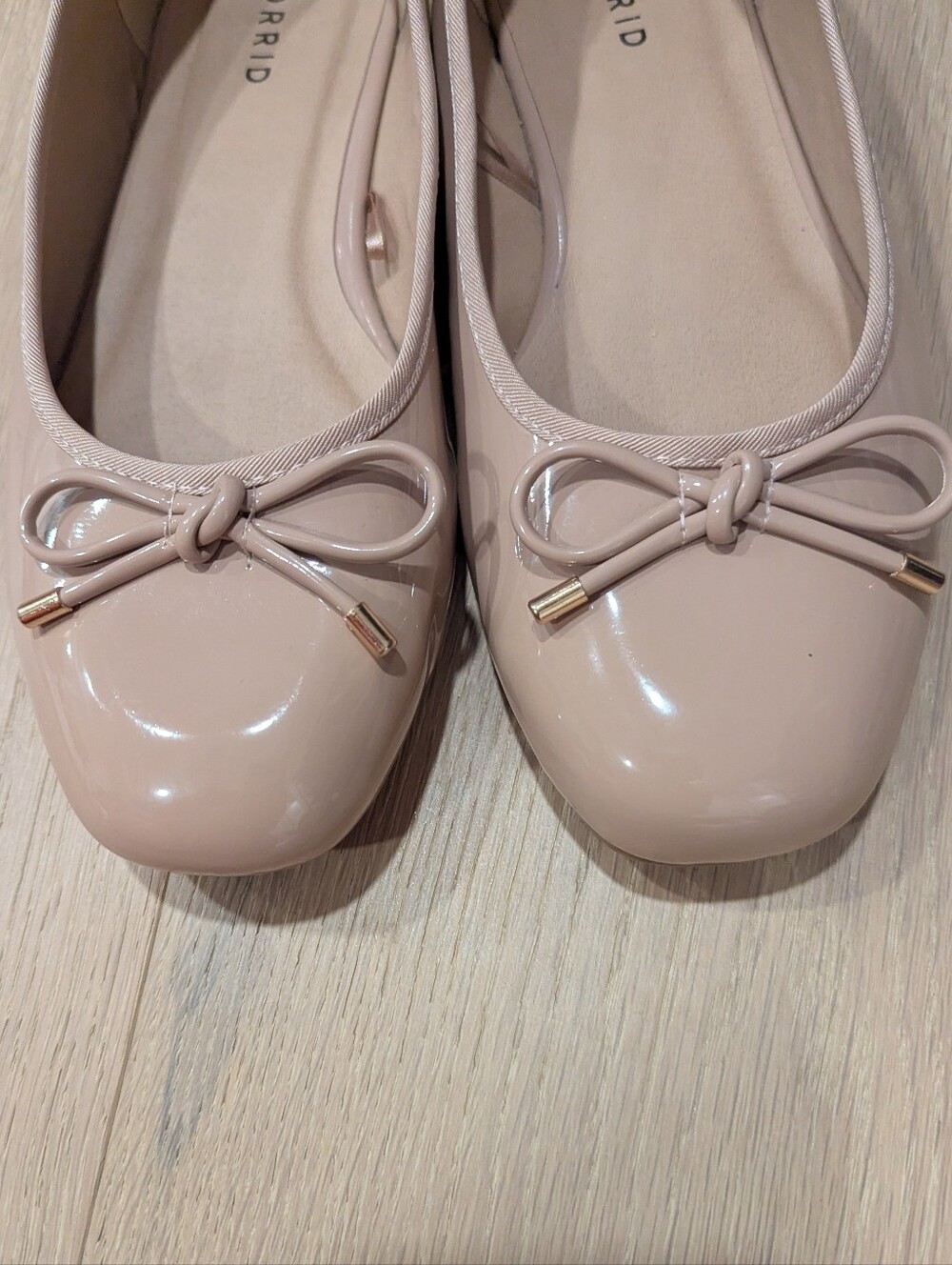 Nude Patent Ballet Flats with Bow